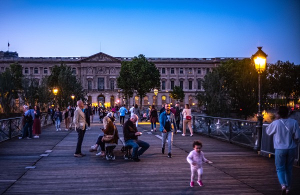 Evening stroll on Pt des Arts leading to the Louvre, Paris.jpg