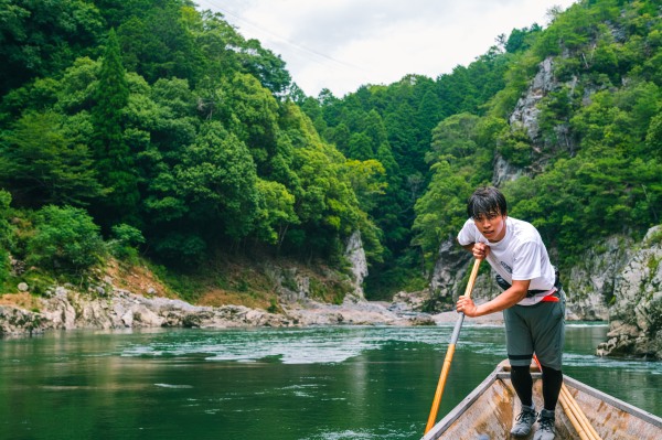 Boat sailor in Arashiyama